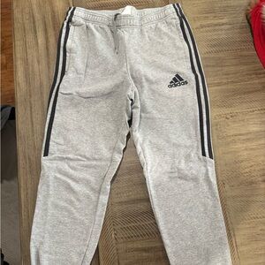 Adidas Woman’s Light Gray Joggers with Black Stripes